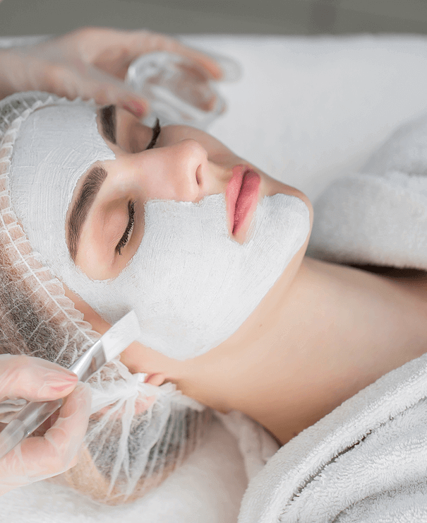 a relaxing woman in clinic doing skincare
